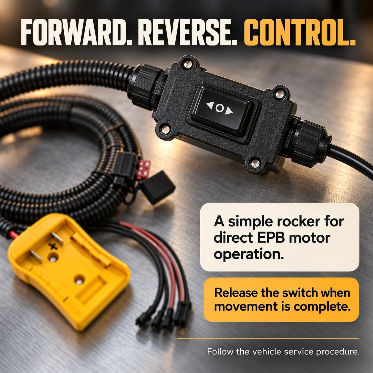 Close-up of the EPB tool's manual forward and reverse rocker controller