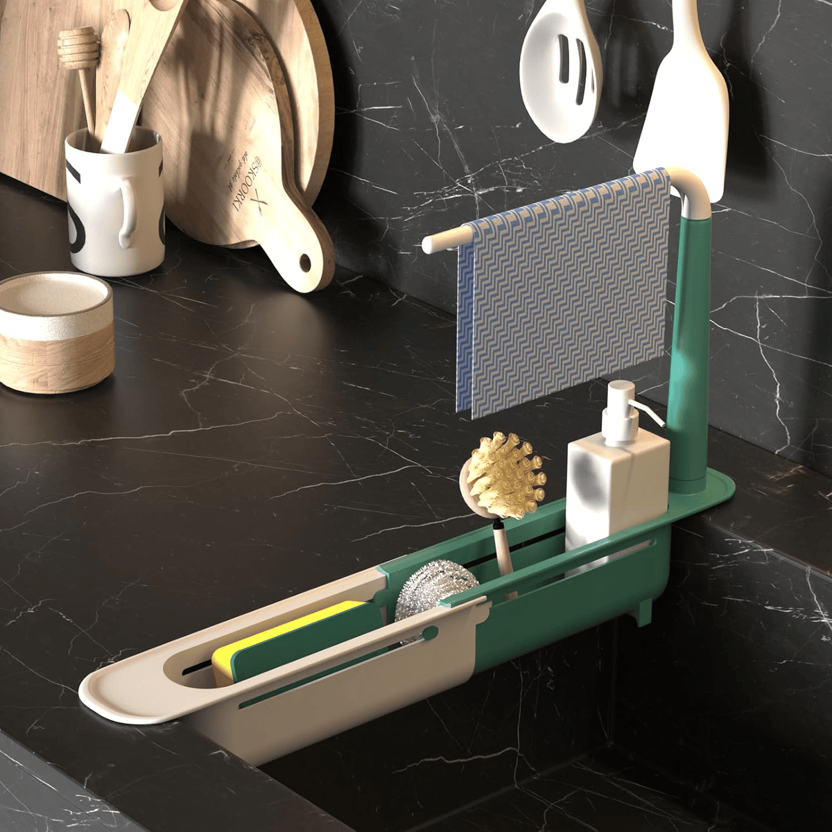 Green and white telescopic sink rack holding a sponge soap and towel in a real kitchen