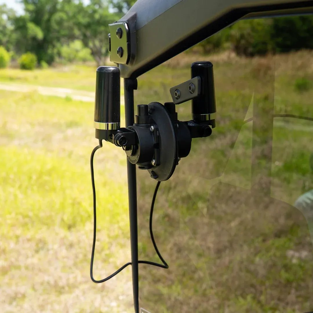 Adjustable GMRS antenna bracket on vacuum mount showing flexible antenna placement