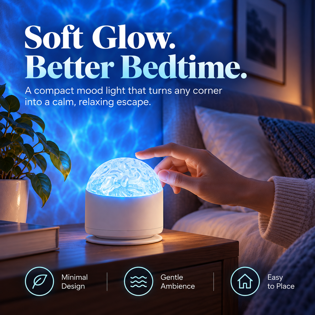 White minimalist ripple projector night light on bedside table casting blue water-like light