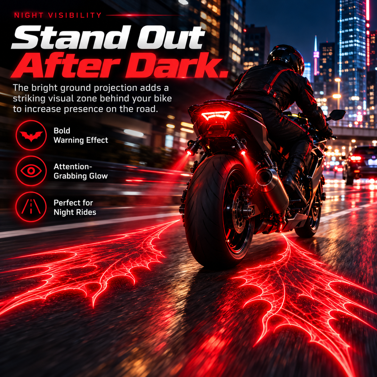 Red bat wing motorcycle laser projection displayed on an urban road at night