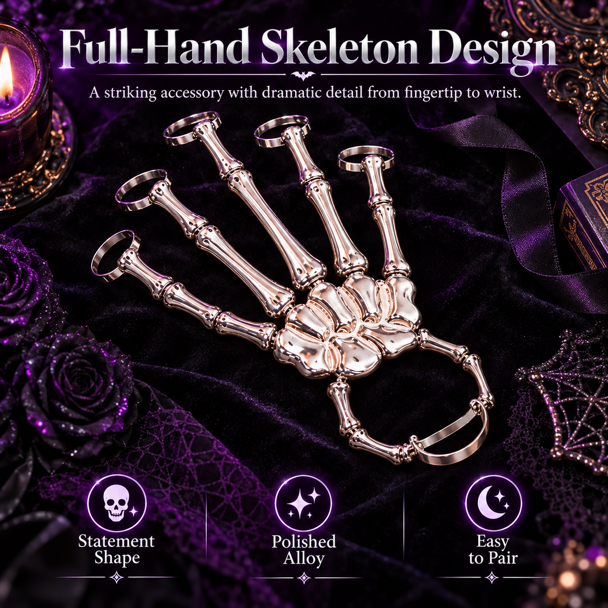 Silver-tone skeleton hand accessory laid flat on dark purple velvet showing connected finger rings, sculpted hand bones and wrist band