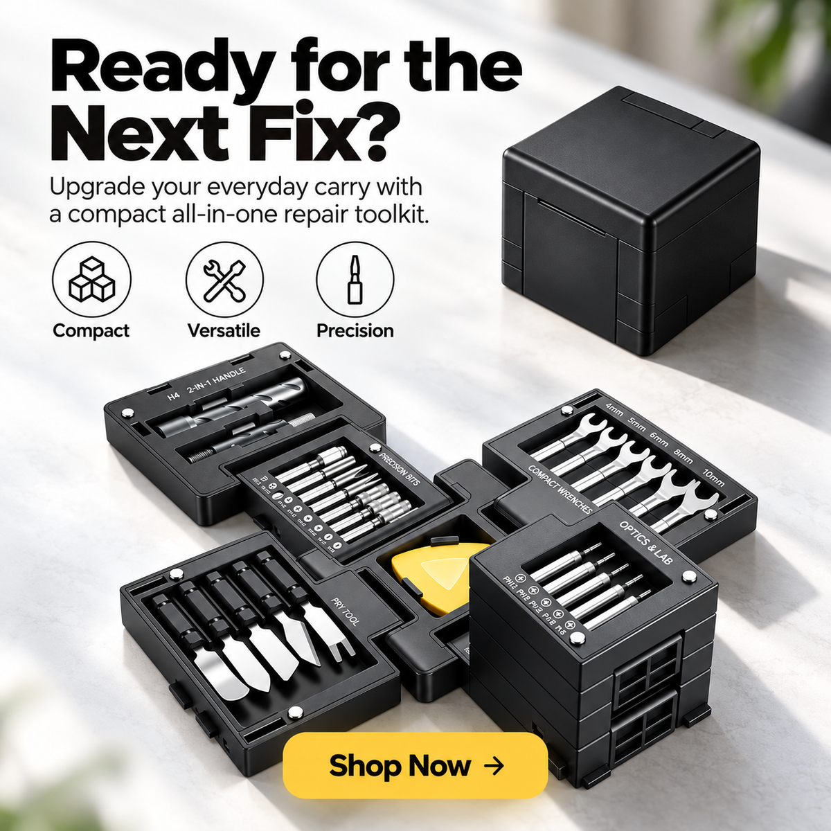 Black modular precision repair cube shown closed and fully unfolded with an organized assortment of miniature tools