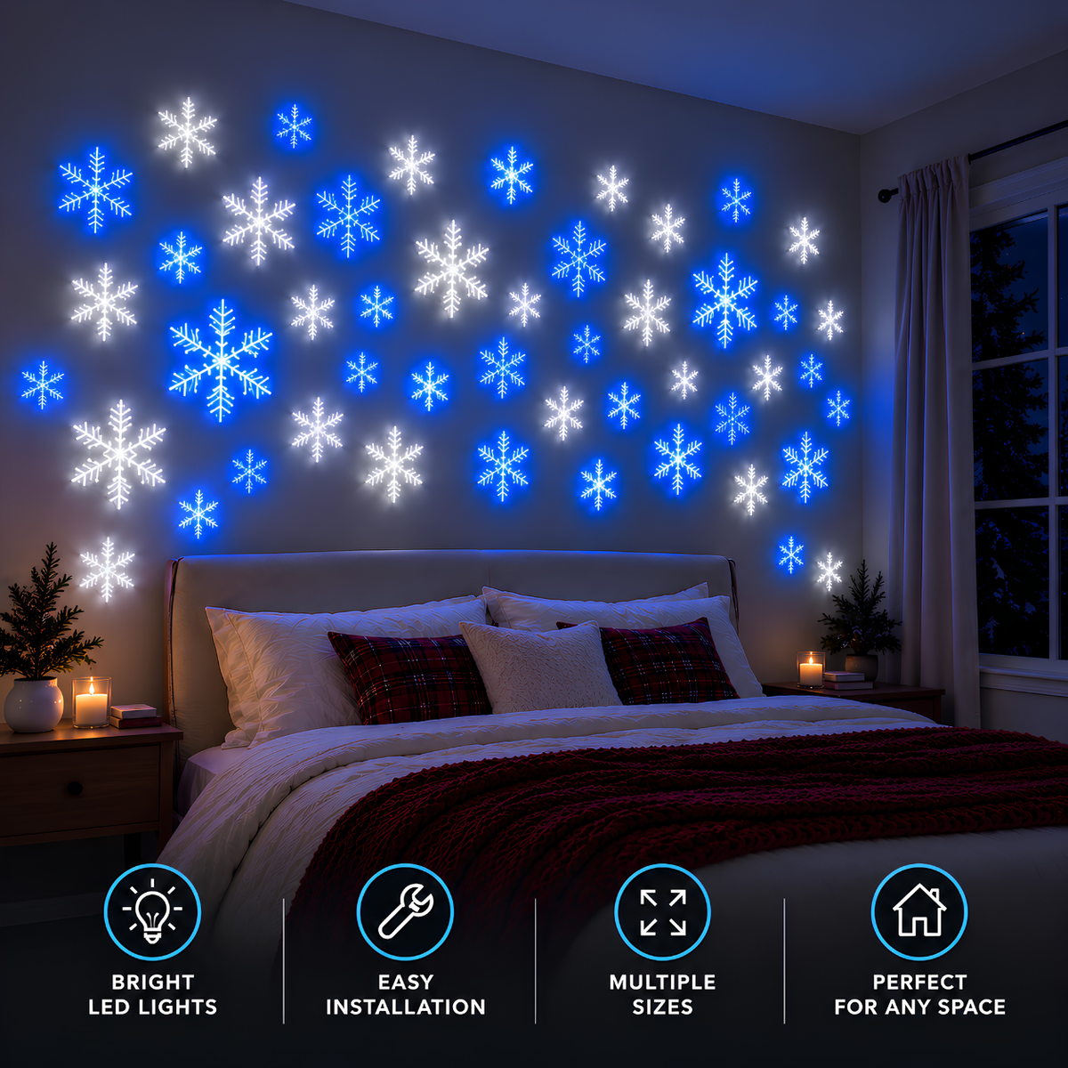Blue and cool-white snowflake lights arranged across a Christmas bedroom wall