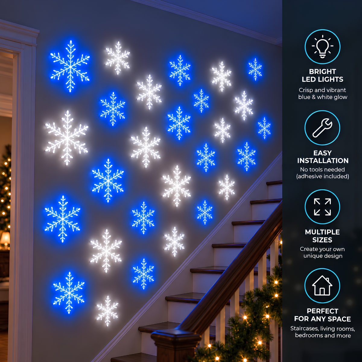 Blue and white snowflake wall lights decorating a Christmas staircase