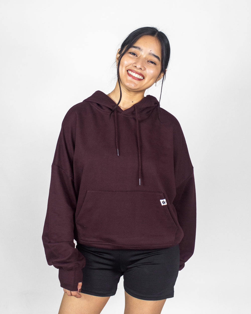 CloudWear hoodie shown in a deep burgundy color