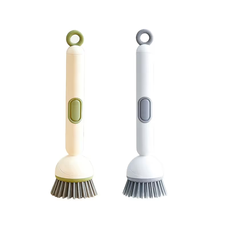Green and white adjustable long-handle dish brushes with integrated soap dispenser buttons and hanging loops