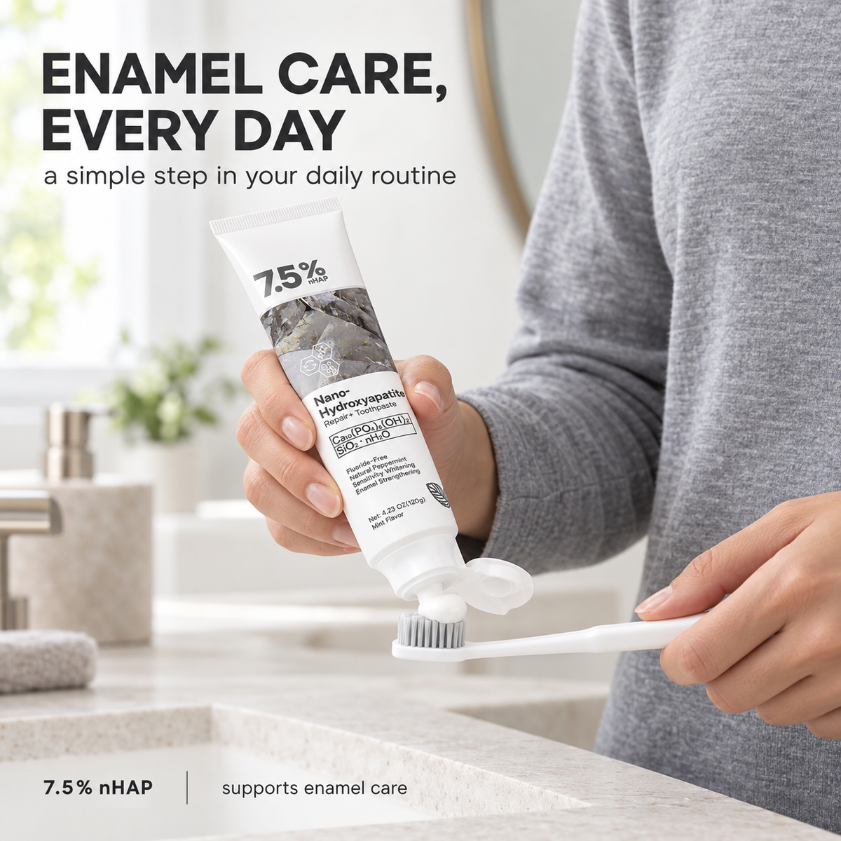 Person applying 7.5 percent nano hydroxyapatite toothpaste to toothbrush