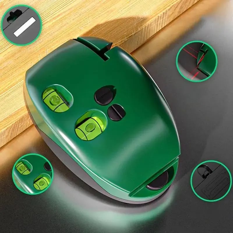 Close view of green laser alignment tool showing bubble levels controls and laser outlet