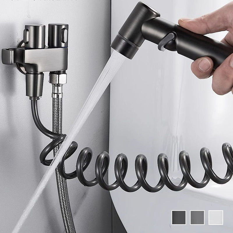 Dual control bathroom valve with handheld bidet sprayer and coiled hose