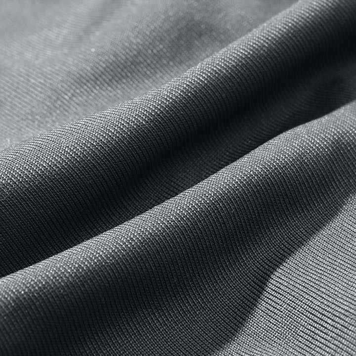 Close-up of textured breathable outer fabric on ergonomic cushion